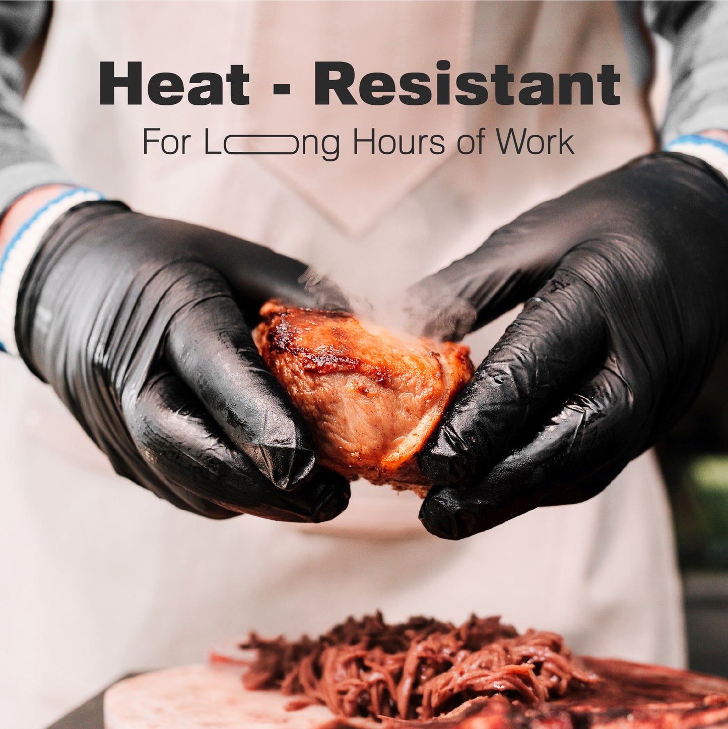 A person wearing Raxwell black heat-resistant BBQ gloves holds a hot piece of roasted meat, with shredded meat on a cutting board below. Text above reads, Heat-Resistant For Long Hours of Work.