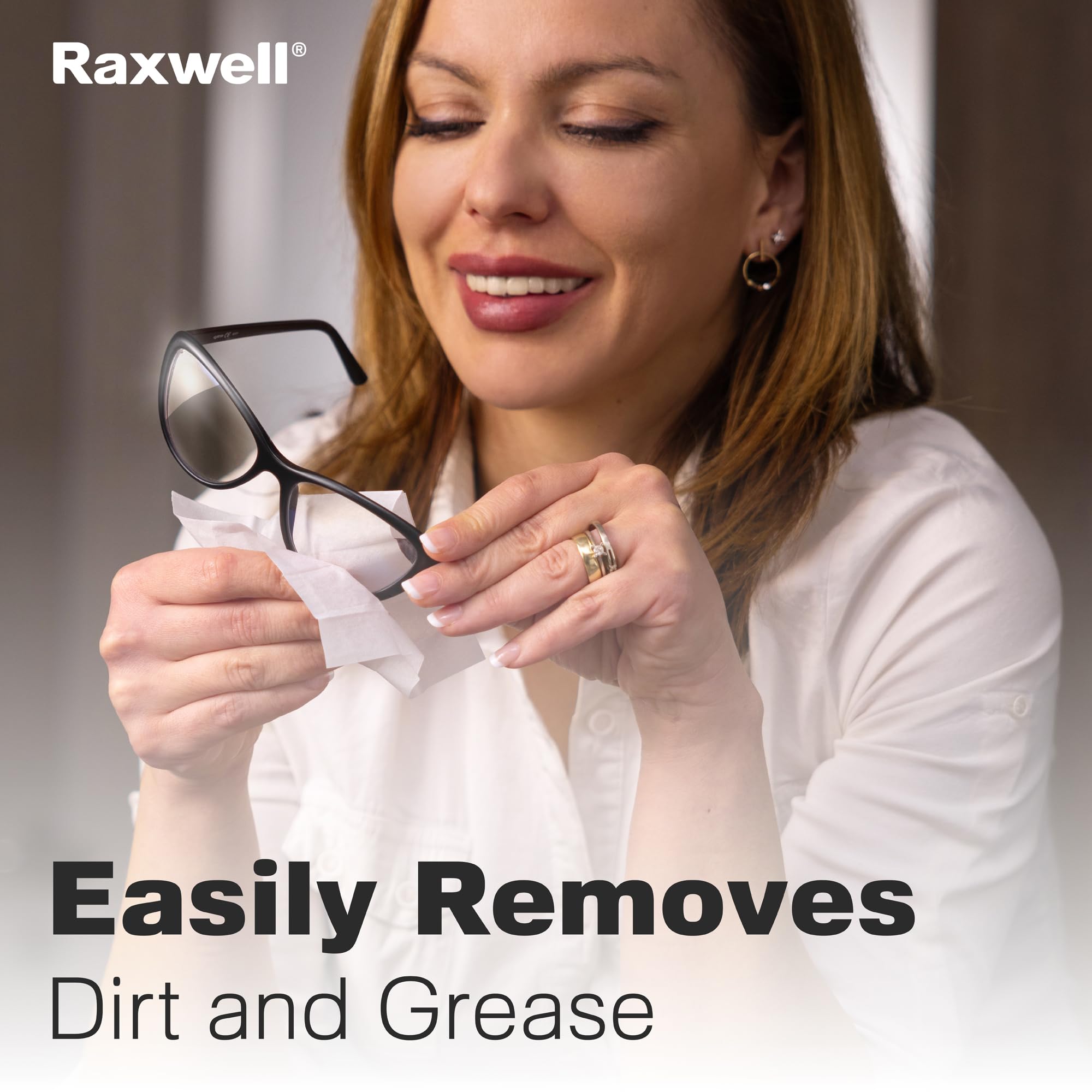 Smiling woman polishes sunglasses with a Raxwell lens wipe. Caption claims the wipe easily removes dirt and grease without streaks.